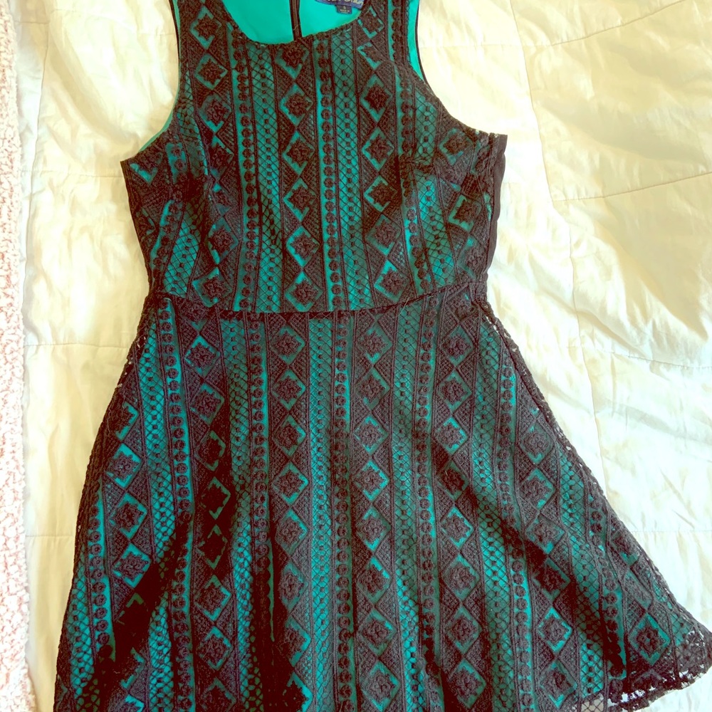 Green and black lace dress